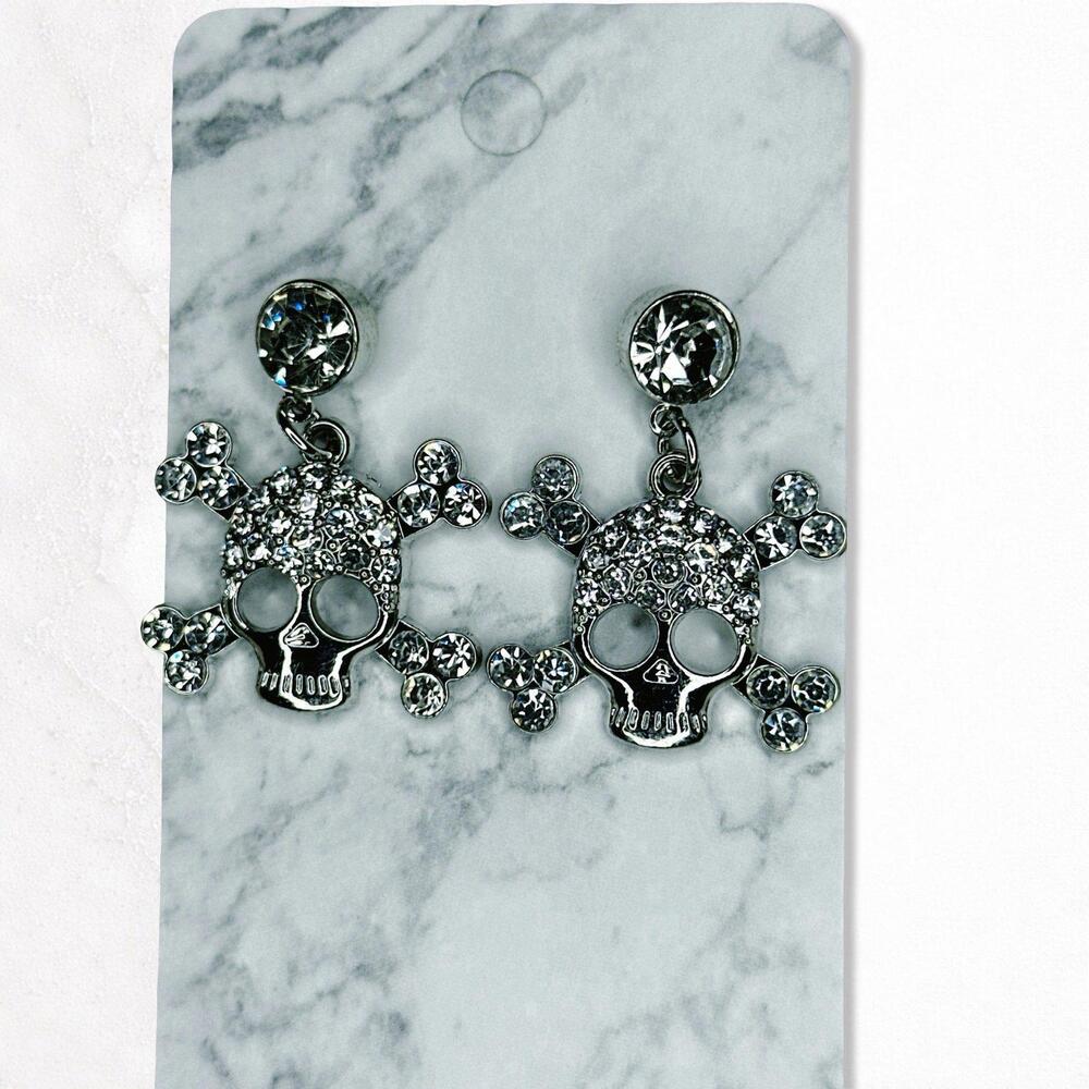 7218. Silvertone Bling Skull Earrings
